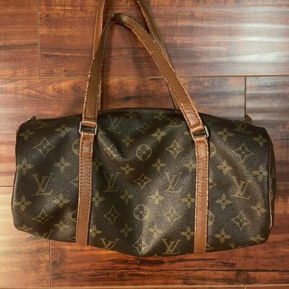 Louis Vuitton Brown Duffel Bag with Iconic Monogram Pattern and Leather Straps